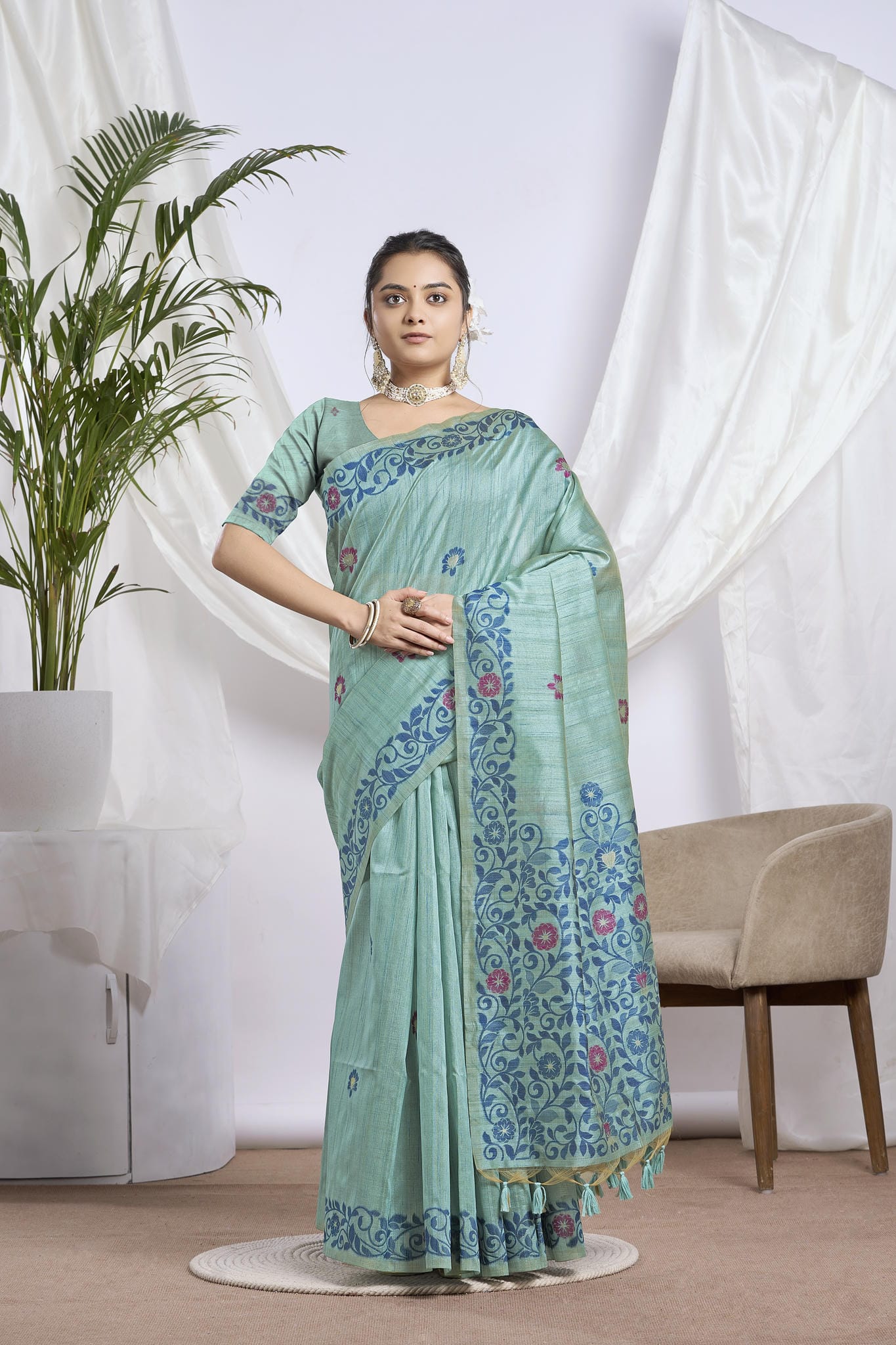 Dhakai Jamdani Saree in Sea Green with Magenta Floral Motifs