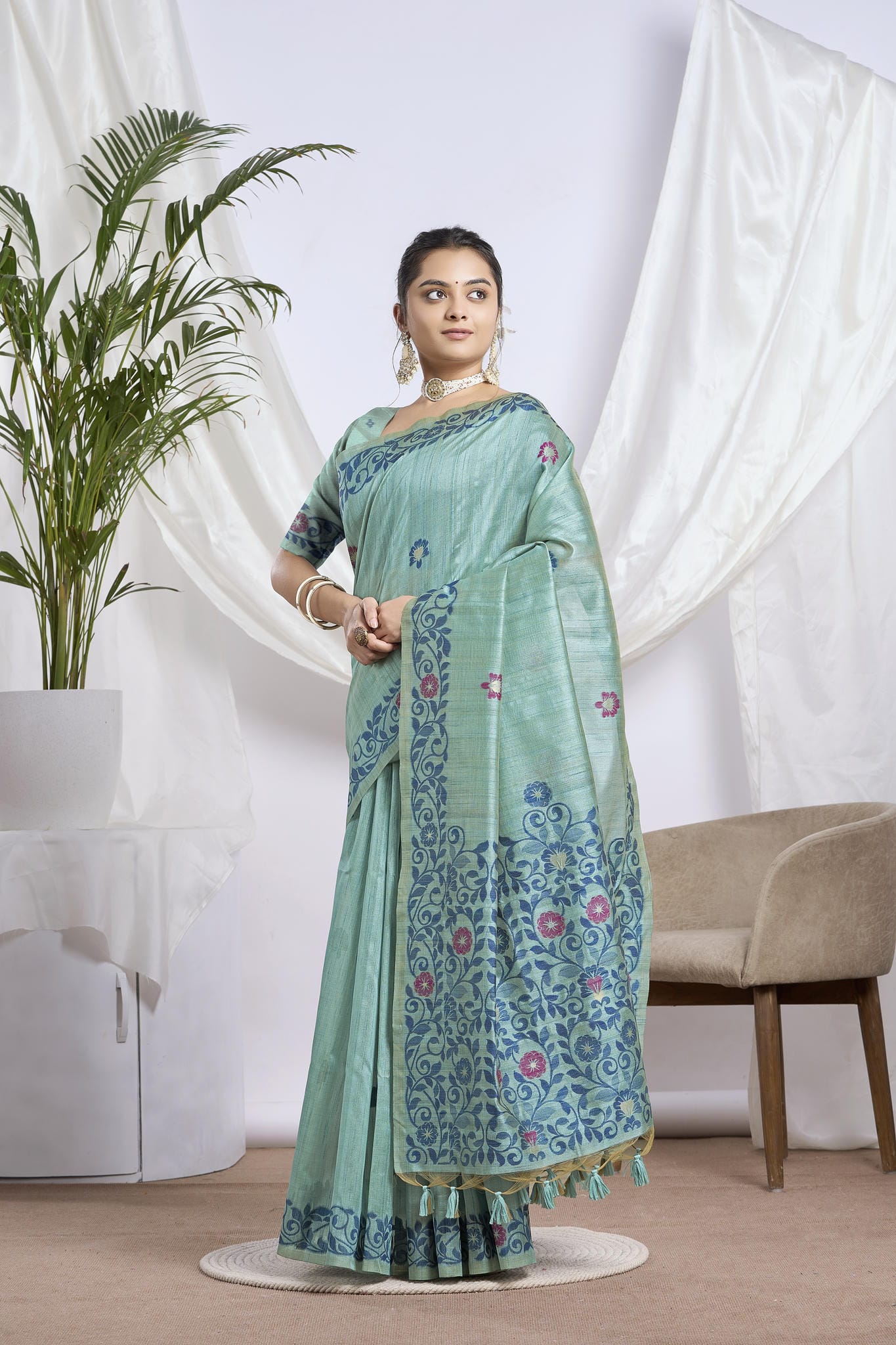 Dhakai Jamdani Saree in Sea Green with Magenta Floral Motifs