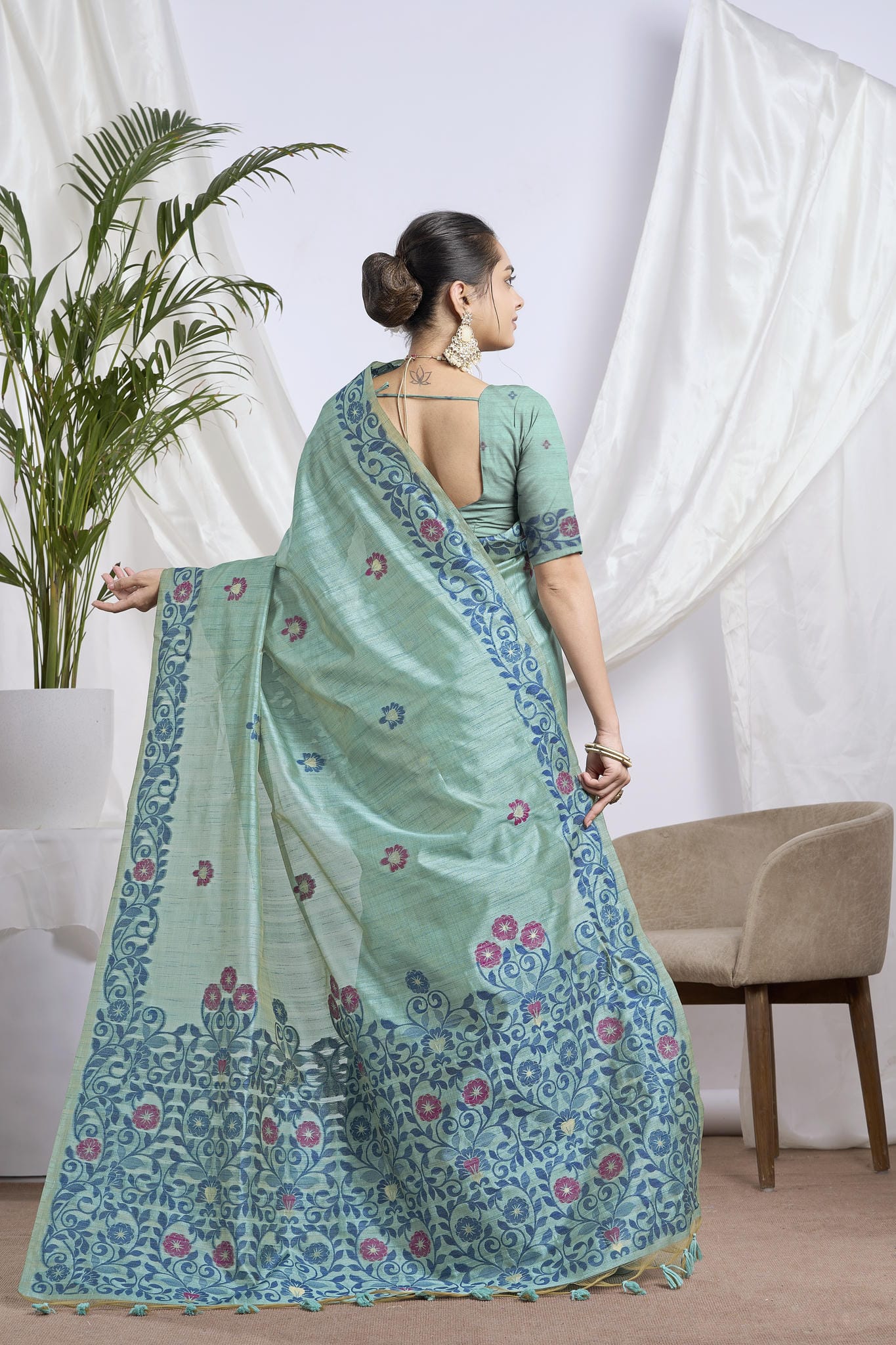 Dhakai Jamdani Saree in Sea Green with Magenta Floral Motifs