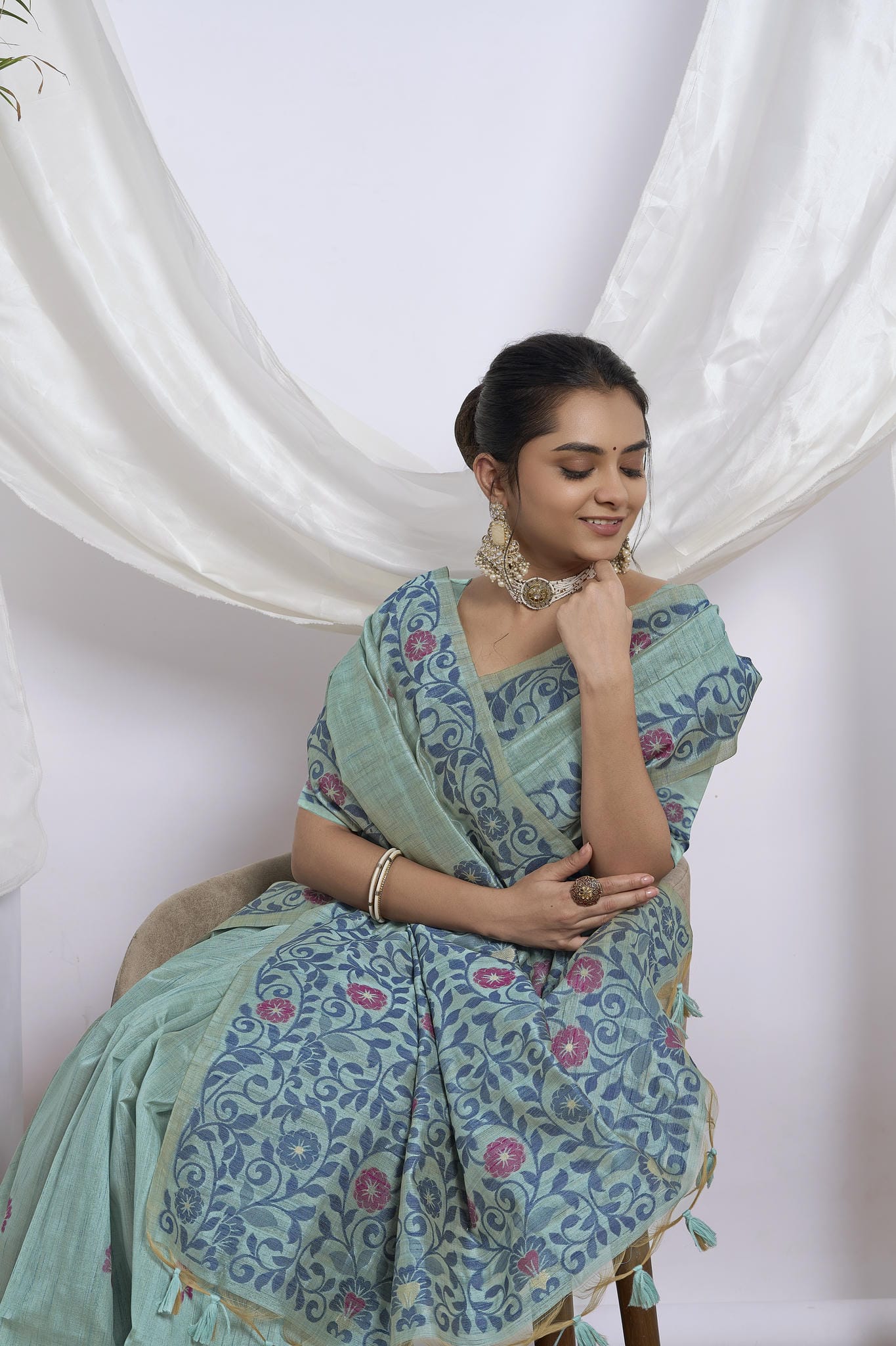 Dhakai Jamdani Saree in Sea Green with Magenta Floral Motifs