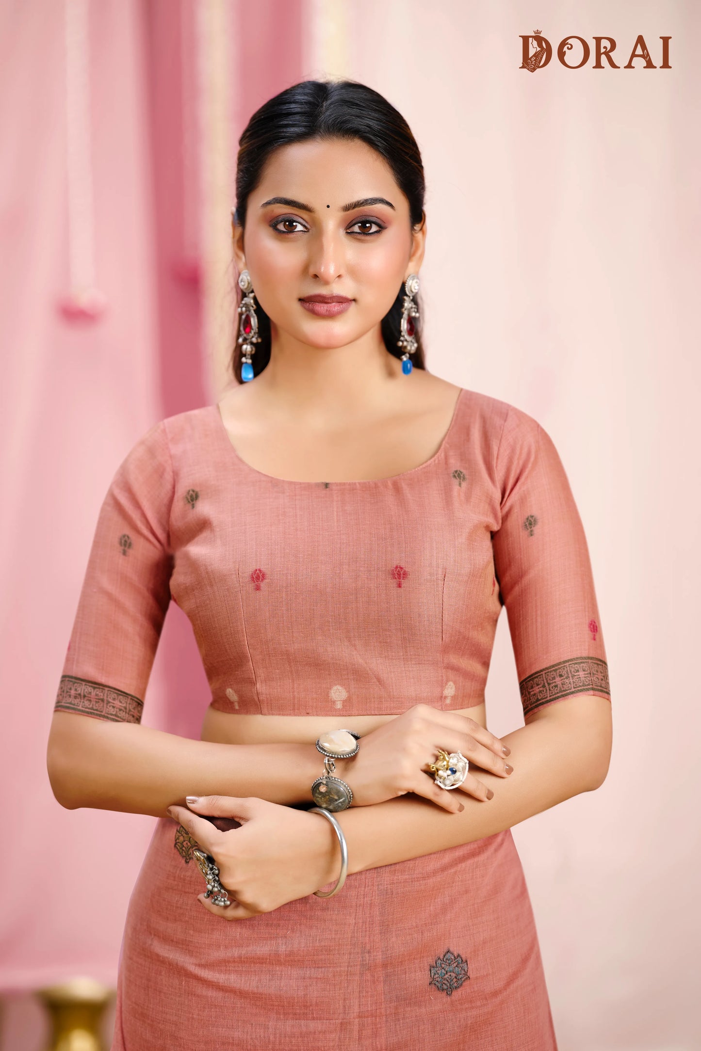 Blush Radiance – Rose Muga Cotton Saree with Peacock Artistry
