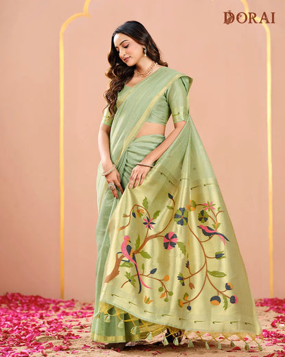 Azure Glint – Sky Blue Muga Tissue Cotton Saree with Nature Artistry