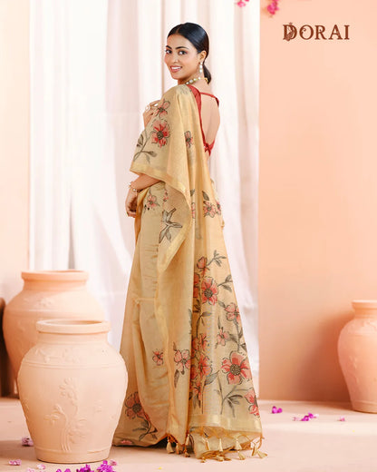 Golden Earth – Chikoo Muga Cotton Saree with Floral Artistry