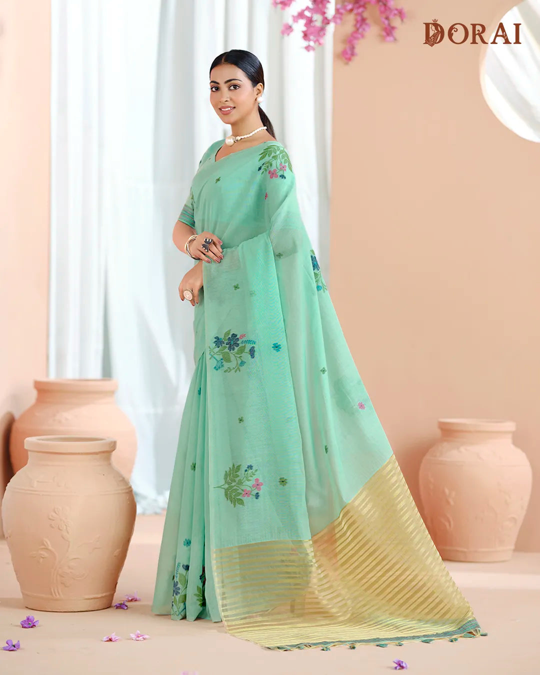 Azure Breeze – Sky Blue Muga Cotton Saree with Floral Charm