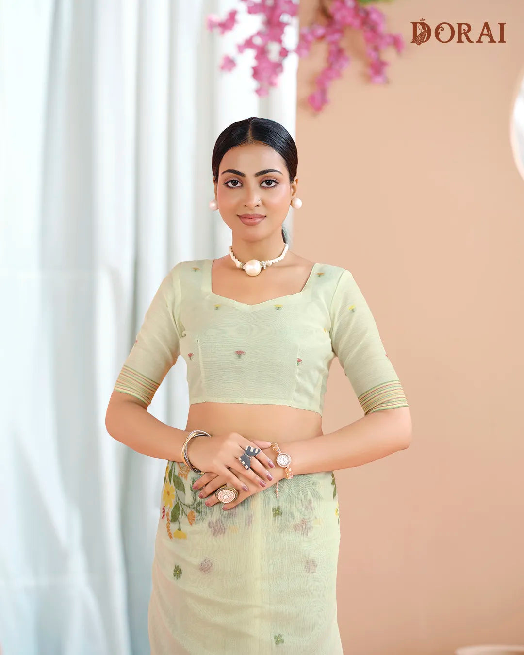 Creamy Radiance – Chikoo Muga Cotton Saree with Floral Artistry