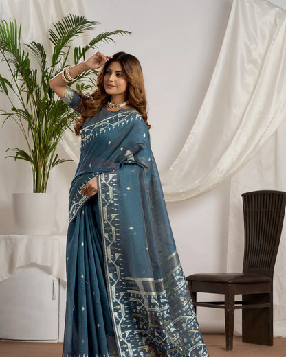 Slate Elegance – Dusty Blue Muga Cotton Saree with Tribal Weave