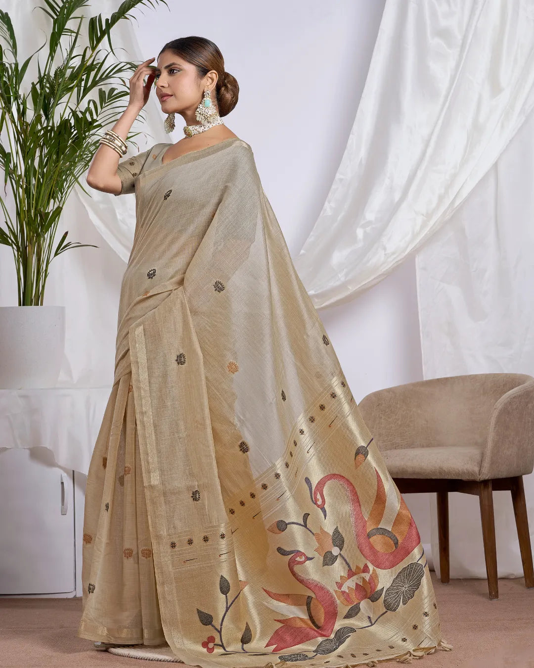 Chikoo Muga Cotton Saree with Jari Border and Peacock Motifs
