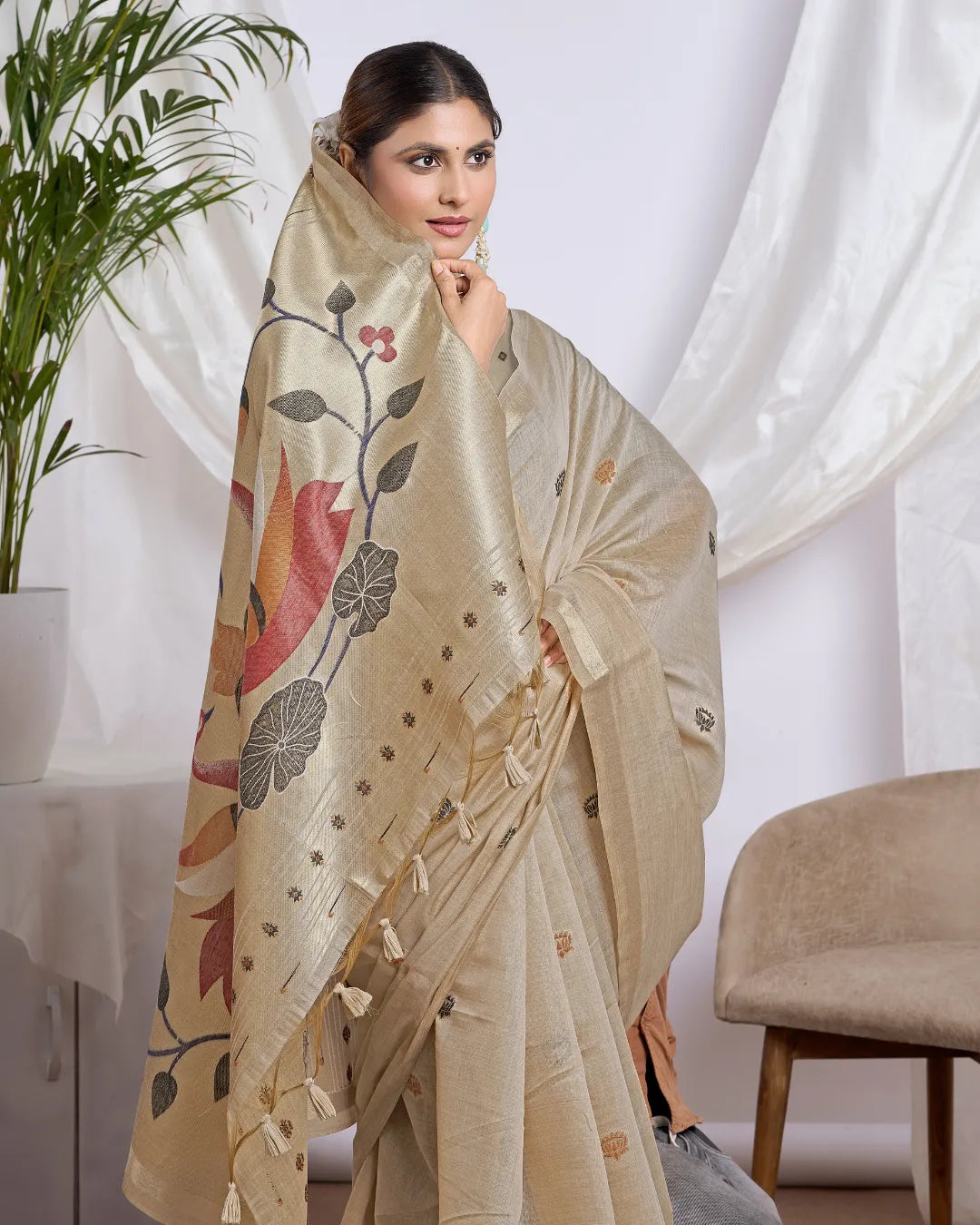 Chikoo Muga Cotton Saree with Jari Border and Peacock Motifs