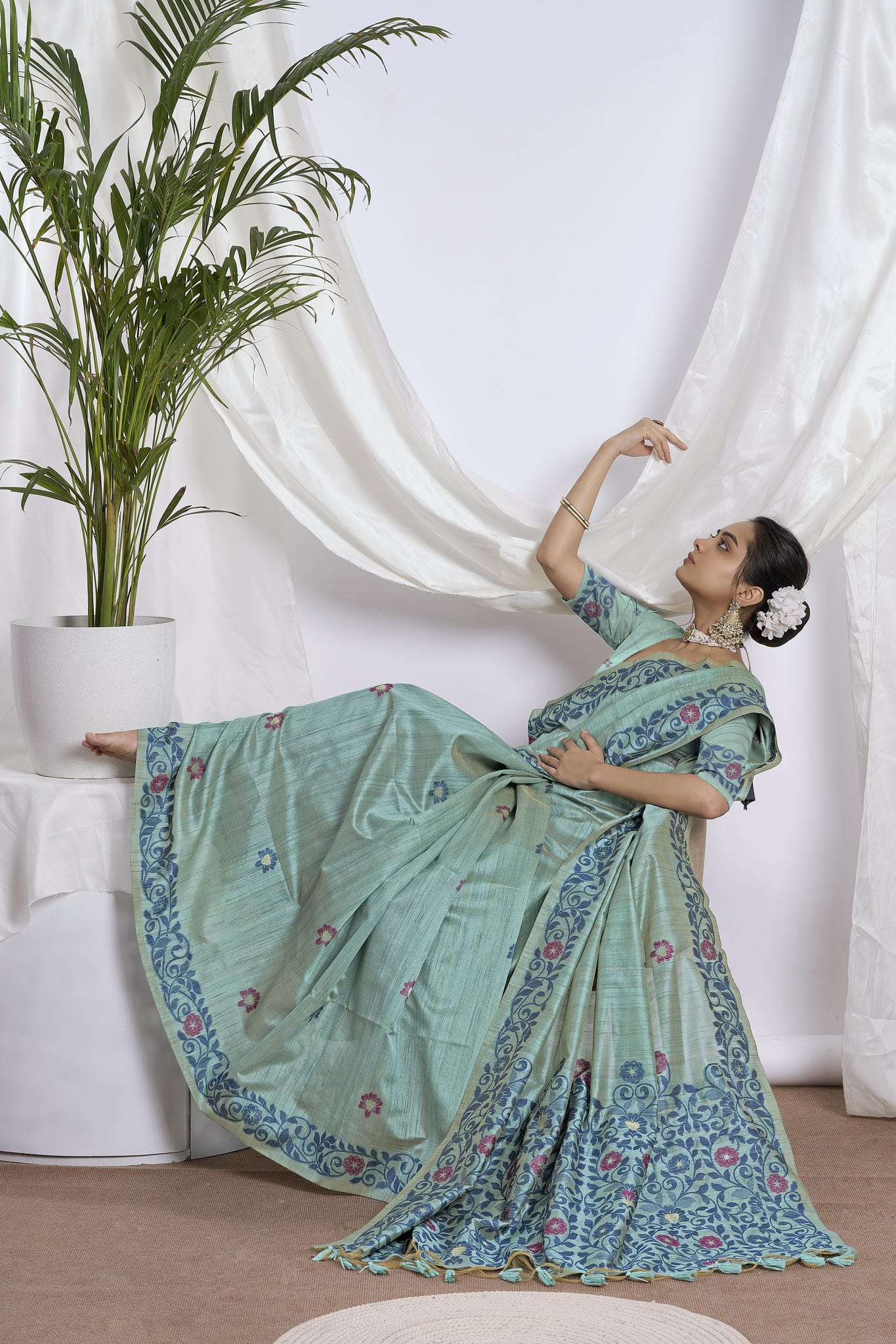 Dhakai Jamdani Saree in Sea Green with Magenta Floral Motifs