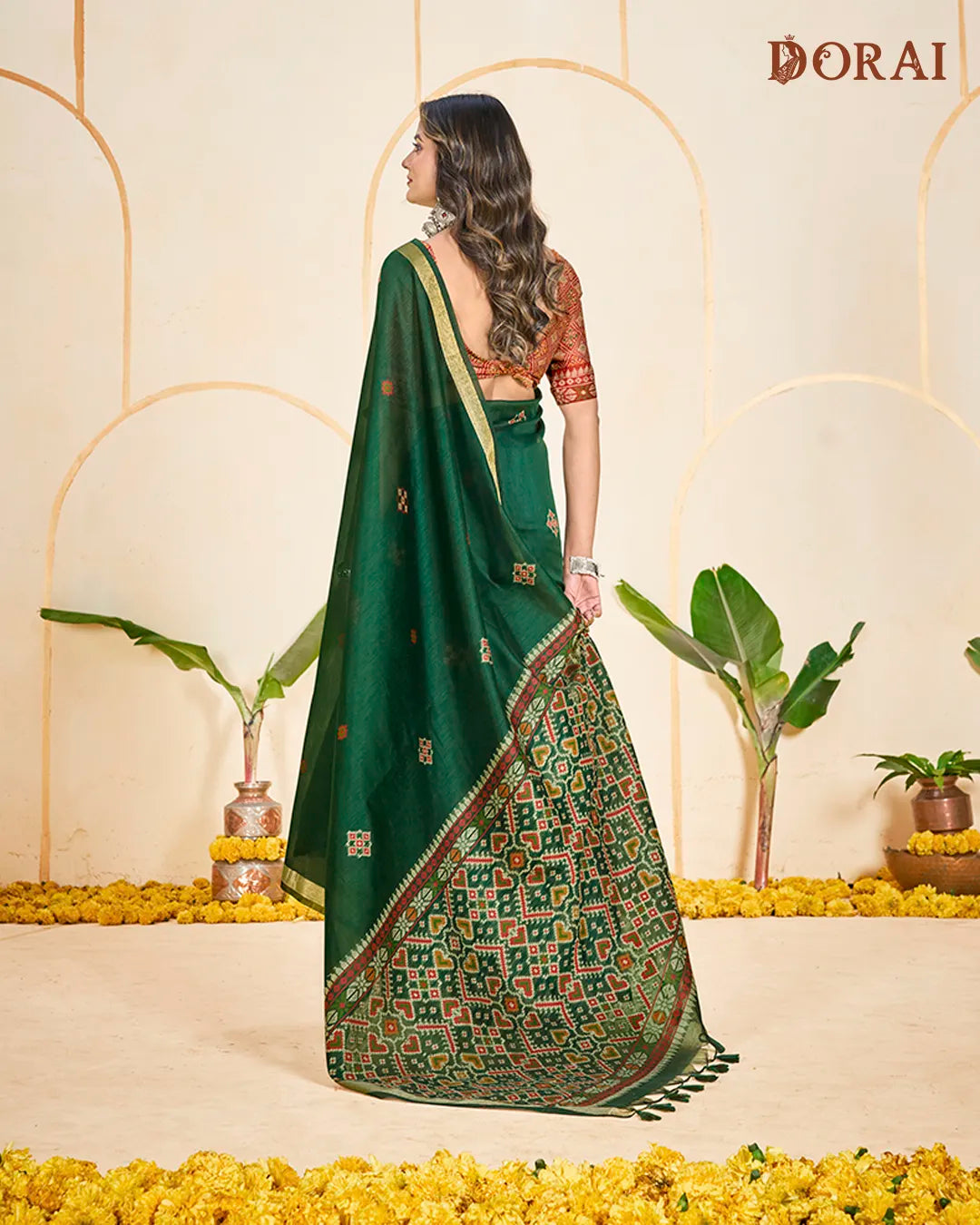 Emerald Heritage – Green Muga Cotton Saree with Patola Pallu Geometric Artistry