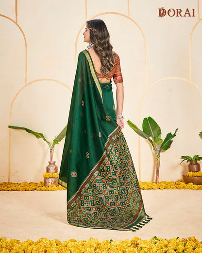 Emerald Heritage – Green Muga Cotton Saree with Patola Pallu Geometric Artistry