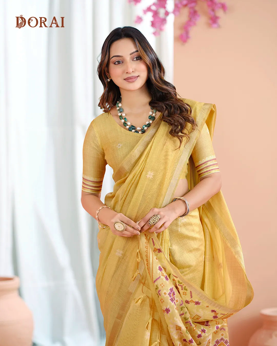 Yellow Patola Pallu Muga Cotton Saree with Zari Border